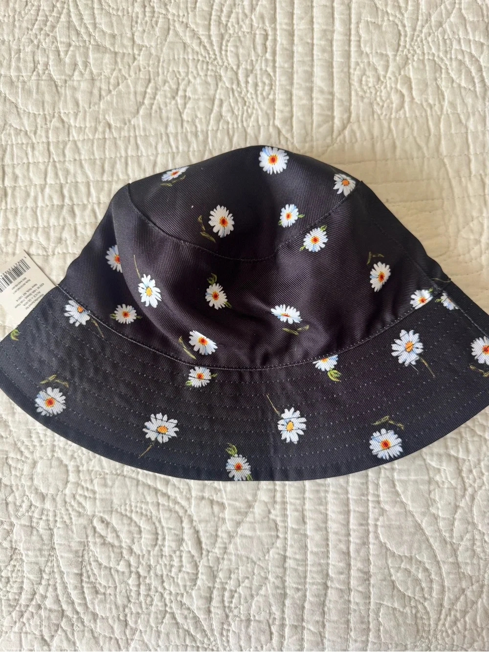 Alice + Olivia Reversible Black Daisy Bucket Hat with White Blossoms